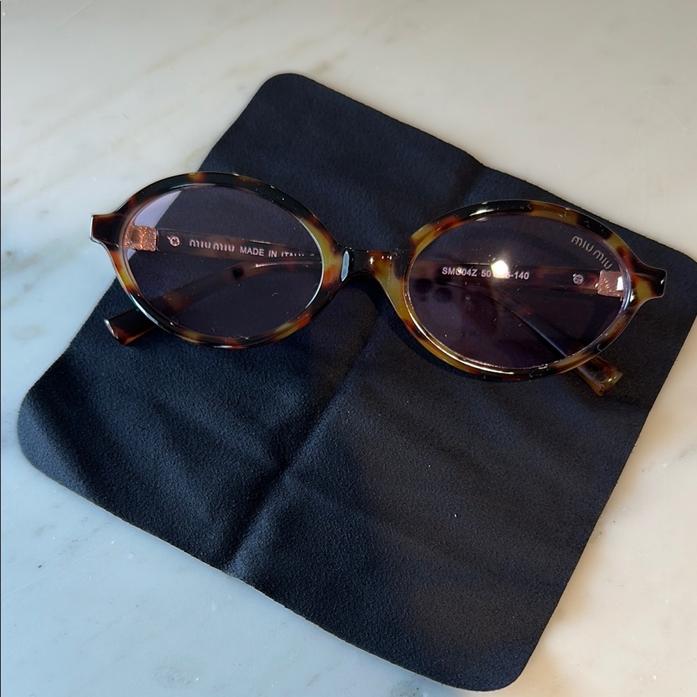 Miu Miu Tortoise Shell Sunglasses
